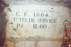 plaque indiquant les travaux IGC de 1864 (niv. moy.)